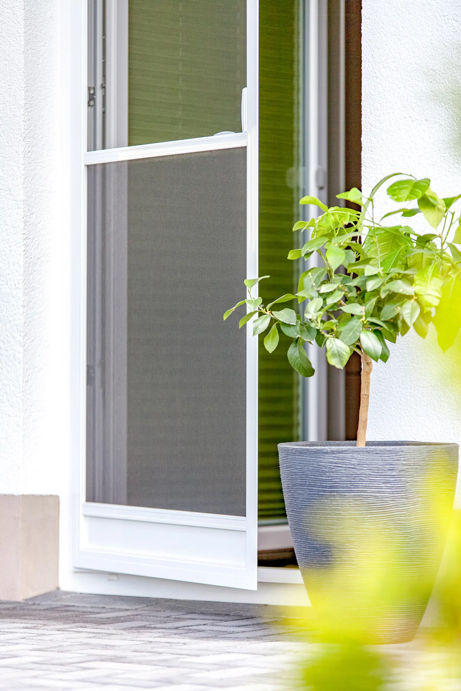 Moustiquaire battante – porte-fenêtre sur mesure